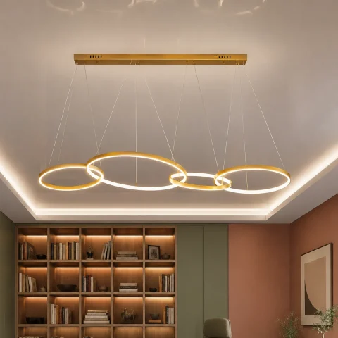 Золота лінійна LED люстра з 4 кільцями Artlight YDH2160/4GD над столом та кухонним островом Золота лінійна LED люстра з 4 кільцями Artlight YDH2160/4GD над столом та кухонним островом