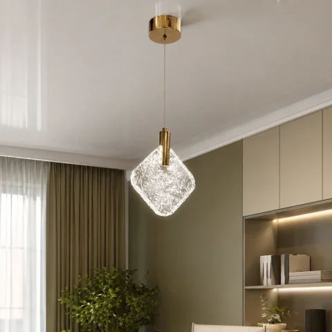 Золотий одиночний підвіс з фактурним прозорим склом Artlight 2333/1GD над столом